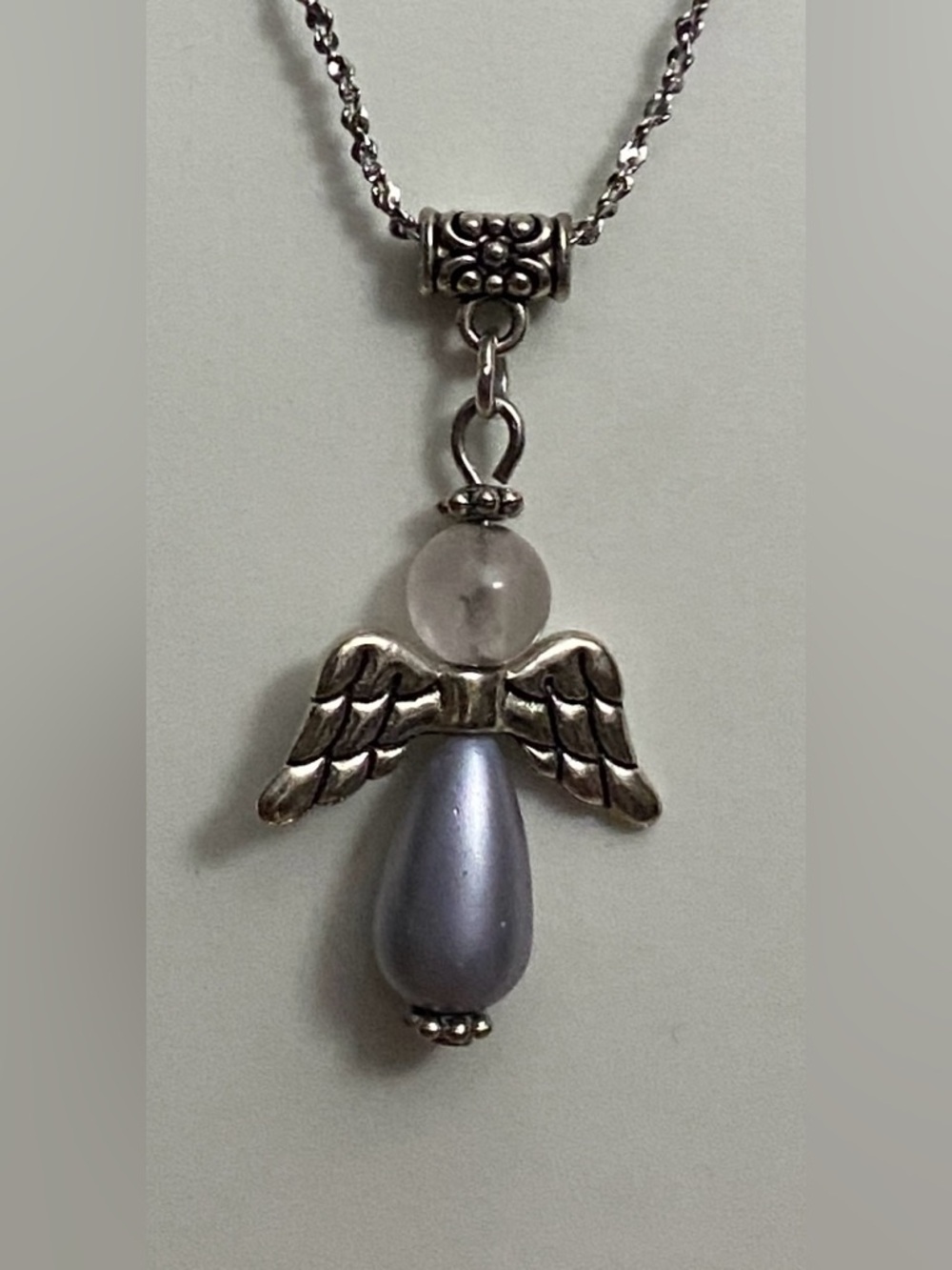 Silver Angel Pendant Necklace with White Pearl and Gray Teardrop